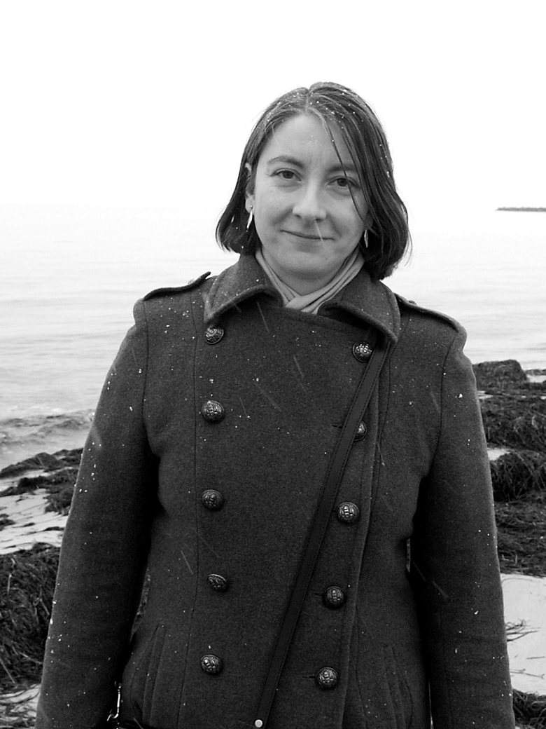 Cornelia Raubal around 2007, in a double-breasted winter coat on a beach